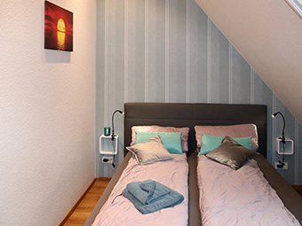 Schlafzimmer 3 mit Doppelbett (160x200).